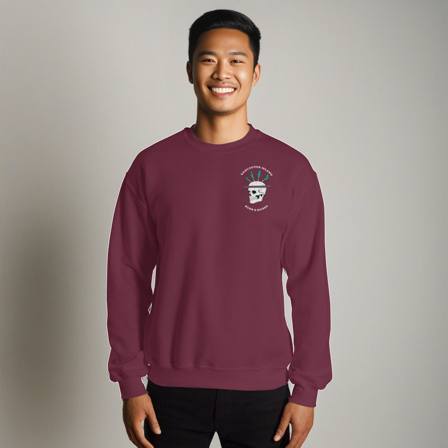 Design of Vancouver Island Born and Raised Skull - Unisex Sweatshirt , the colour is Maroon