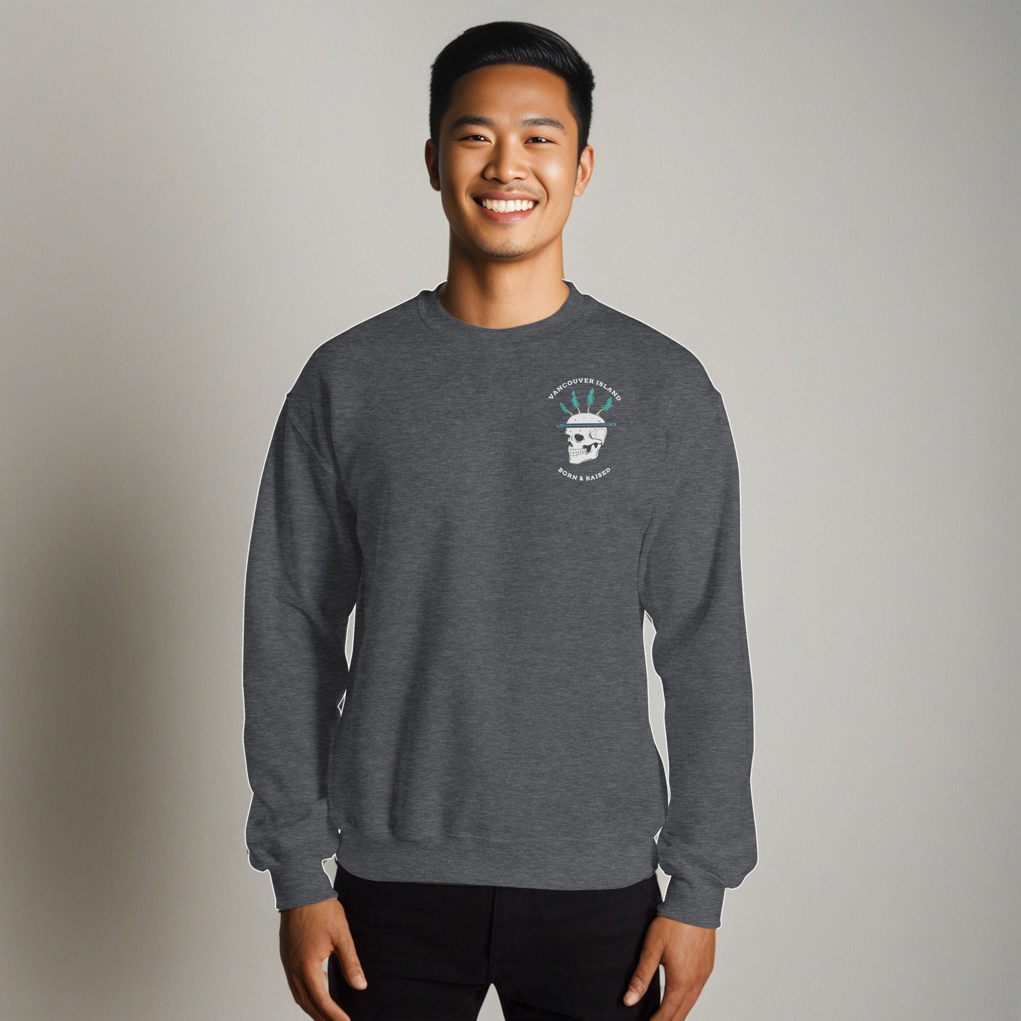 Design of Vancouver Island Born and Raised Skull - Unisex Sweatshirt , the colour is Dark Heather